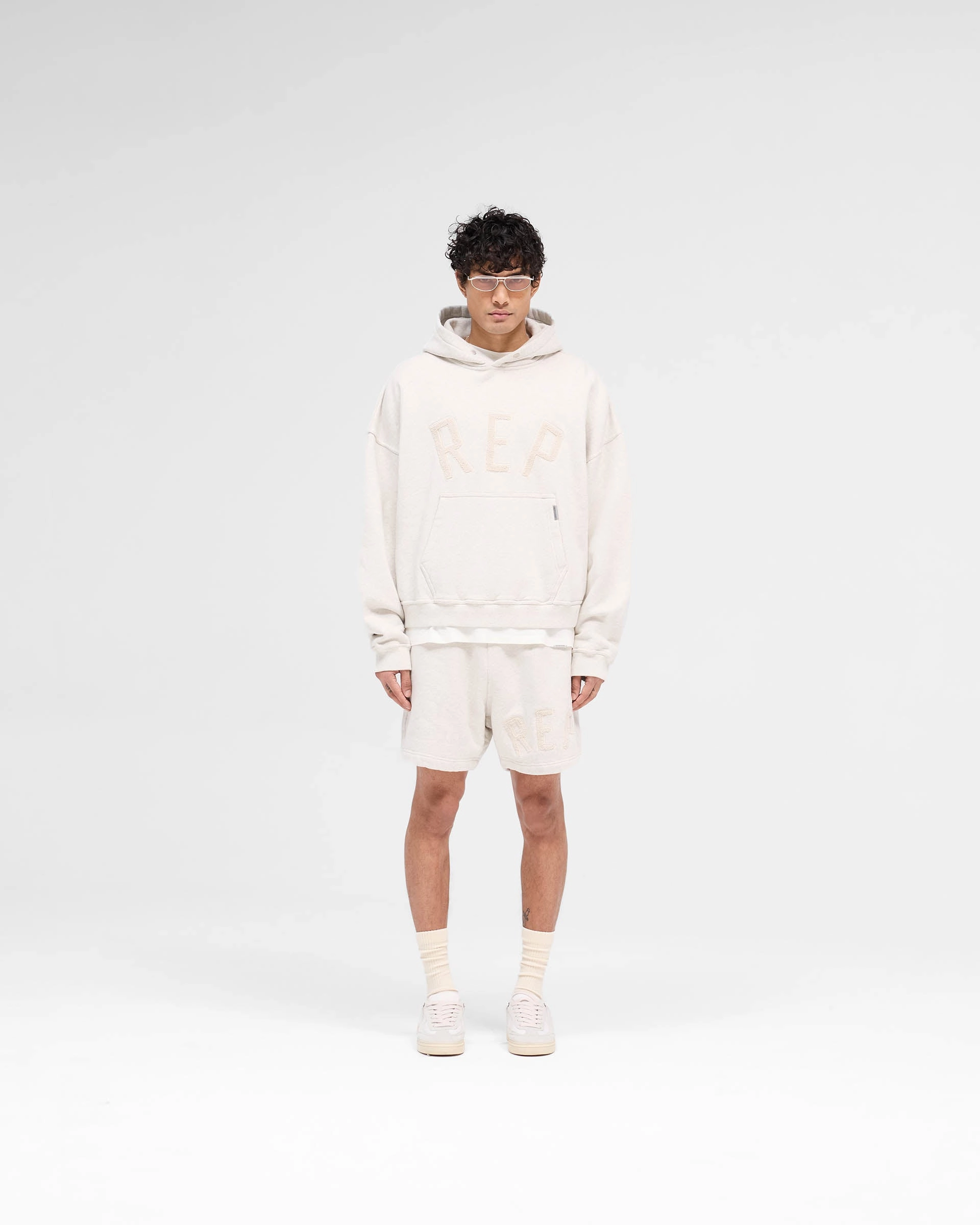 NonIrritatingTags Outdoor Fit Rep Applique Shorts - Cream Marl