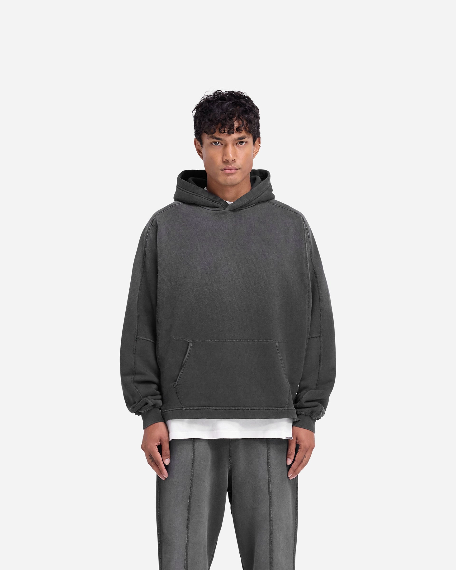 Stepped Hem Hoodie - Stained Black Oversized Silhouette