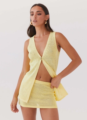 Capri Glow Knit Mini Skirt - Canary Artistic Influence
