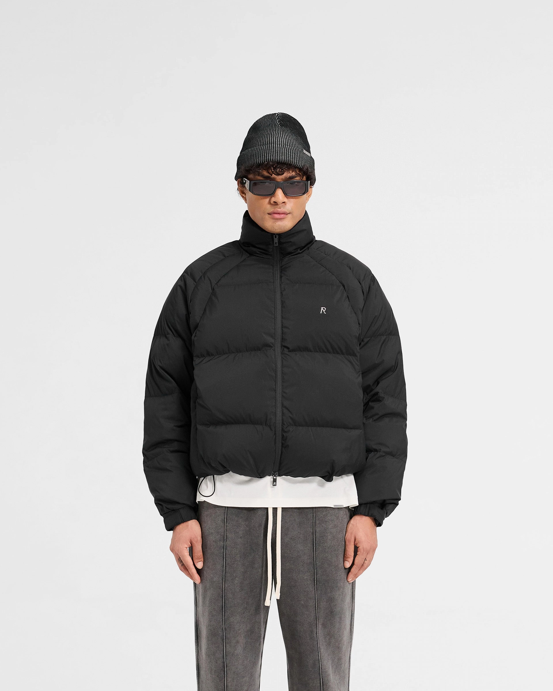 Low Profile Collar Design Ergonomic Fit Funnel Neck Puffer - Black