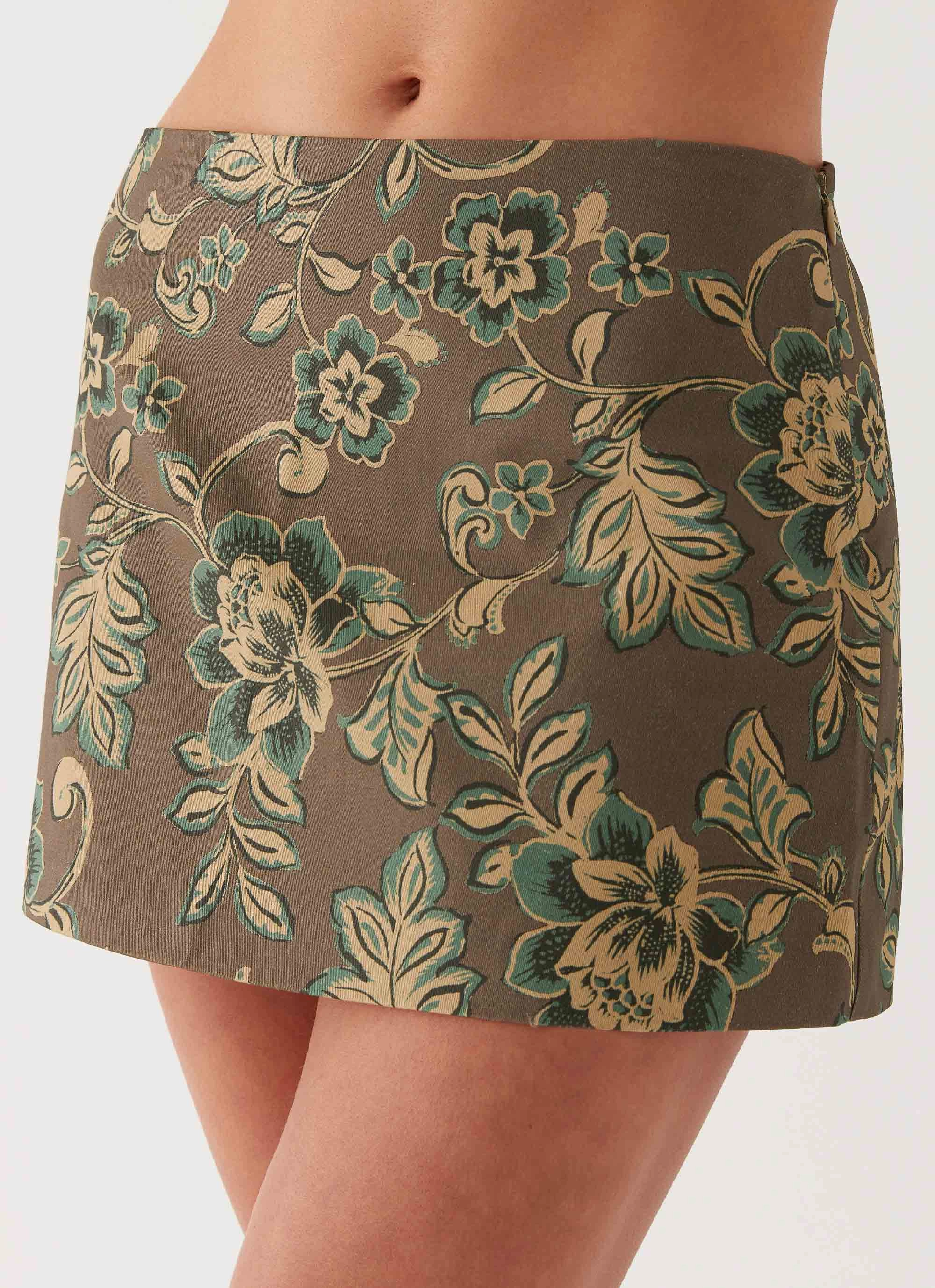 Tonnie Floral Mini Skirt - Brown Floral Travel Vibes perforated design